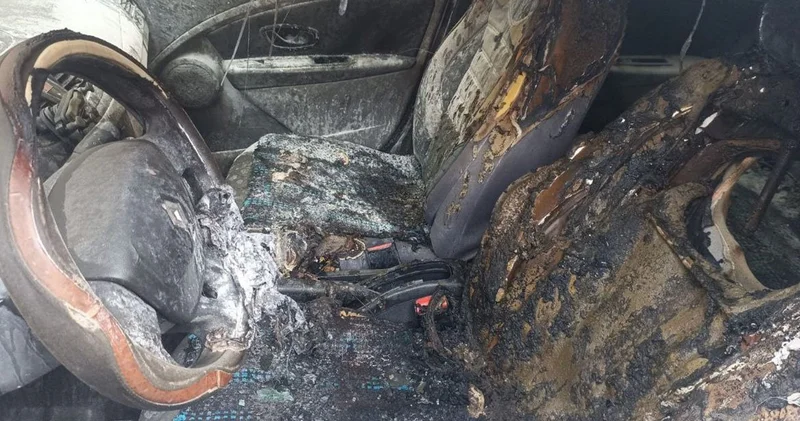 Ölümle tehdit edip otomobilini ateşe verdi