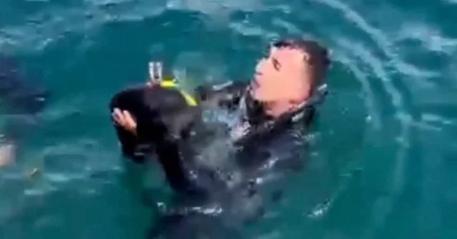 Çanakkale de mendirekte mahsur kalan kediyi sahil güvenlik ekipleri kurtardı VİDEO İZLE