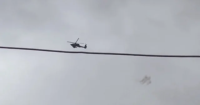 İsrail helikopteri Morag Koridoru nda yardım bekleyen Gazzelilere ateş açarken görüntülendi VİDEO İZLE