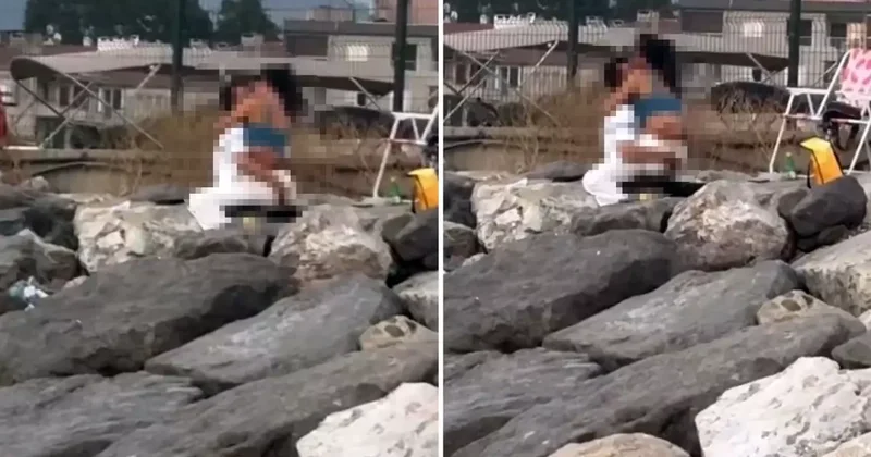 Yat limanında uygunsuz görüntü: Kayaların üzerinde kimseye aldırış etmediler