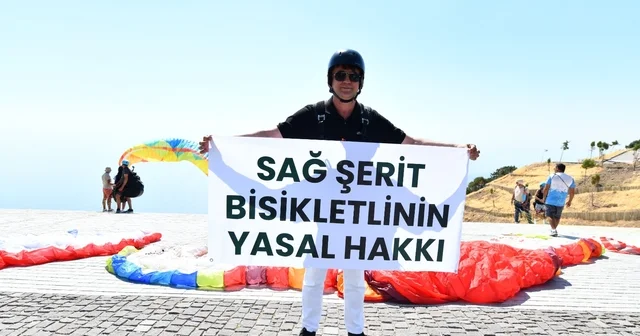 Belediye Başkanı Karaca, bisiklet farkındalığı için yamaç paraşütü yaptı Muğla Haberleri