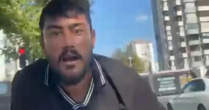 Cam silme bahanesiyle aracın kaputuna yatıp zorla para istemişti, tutuklandı