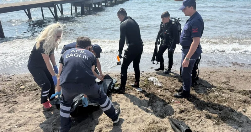 Denize atlayan çocuğu kurtarmak isterken akıntıya kapıldı
