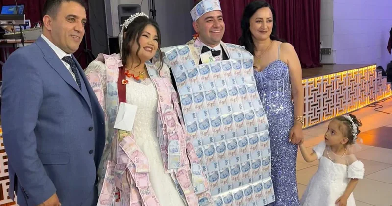 Takı merasiminde dikkat çeken damat yeleği