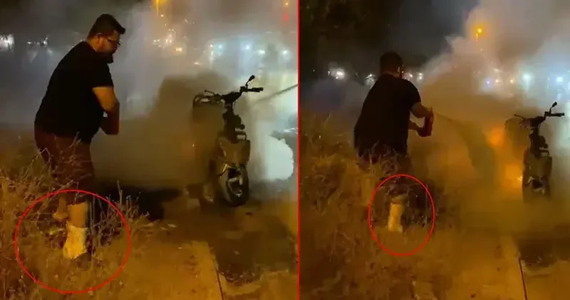 Motosikletteki yangına kırık bacağıyla müdahale etti; o anlar kamerada