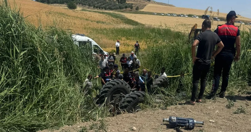 Yangını söndürmek isterken traktörün altında kaldı
