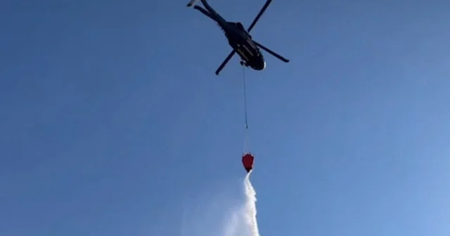 Yanan saman balyalarına jandarma helikopteriyle müdahale VİDEO İZLE