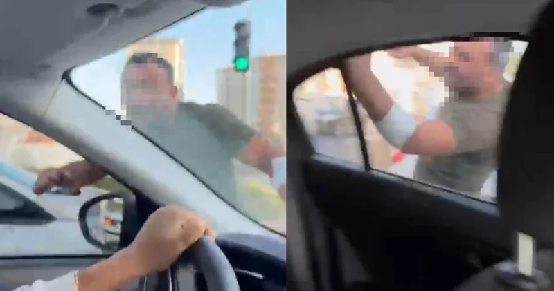 Pes dedirten görüntü! Trafikte tartıştığı kadınların otomobilini yumrukladı