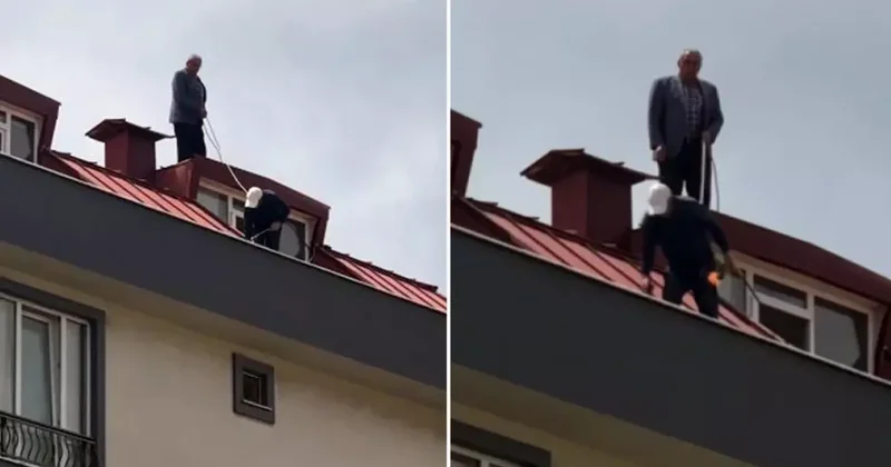 Çatı tadilatı yapan işçi beline ip bağlayarak güvenlik önlemi aldı