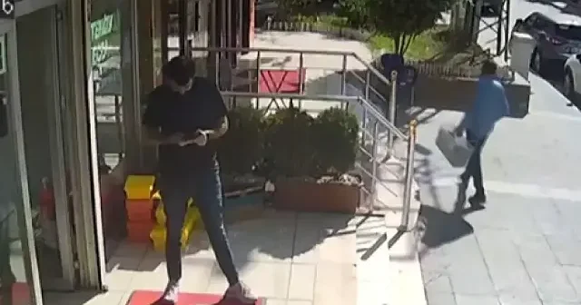 Rahatlığıyla pes dedirten dondurma hırsızı kamerada VİDEO İZLE