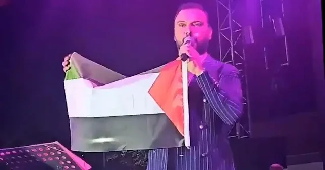 Şarkıcı Alişan Filistin bayrağı açarak İsrail zulmüne karşı dua etti VİDEO İZLE