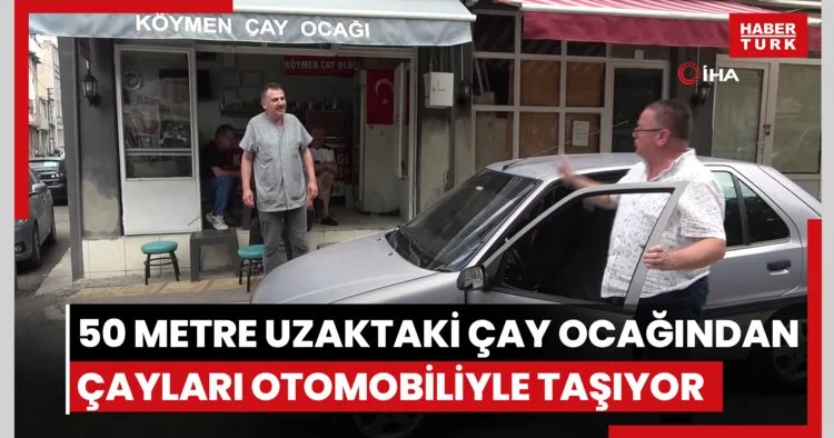 50 metre uzaklıktaki çay ocağından aldığı çayları otomobiliyle taşıyor