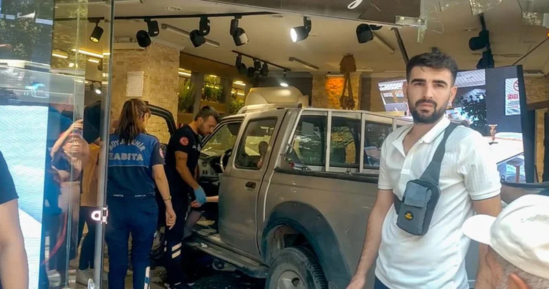 Tansiyonu düşen sürücü mağazaya daldı
