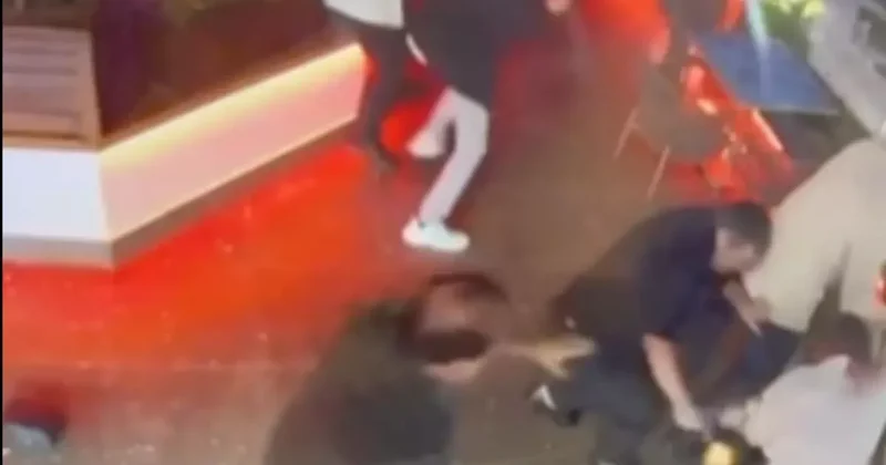 Otelin terasında silahlı şampanya kavgası