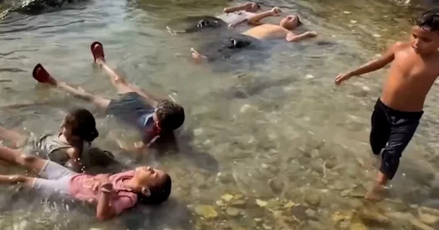 Gazzeliler bir yanda açlık diğer yanda sıcak havayla mücadele ediyor VİDEO İZLE