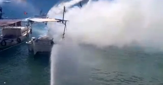 Yanan tekneye hortum, jet ski ve flyboard ile müdahale Antalya Haberleri