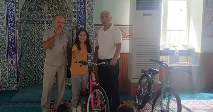 Çine’de Kur’an ı Kerim’e geçen öğrencilere bisiklet hediye edildi