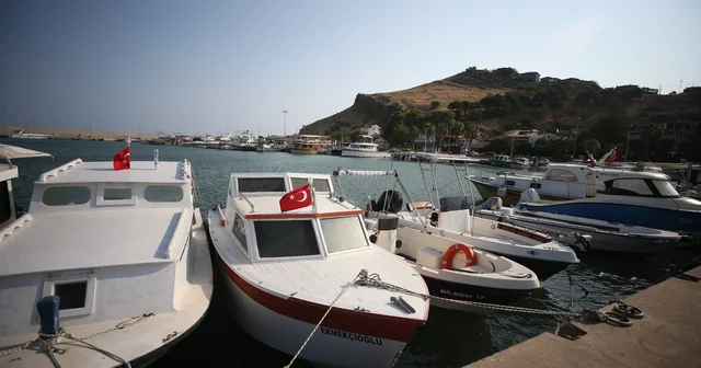 Sahil Güvenlik ekiplerini tehdit etti, bayrak ve fidan teminiyle uzlaştı Çanakkale Haberleri