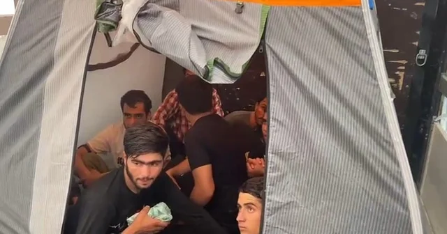 TIR ın dorsesindeki kamp çadırlarından 17 kaçak göçmen çıktı Amasya Haberleri