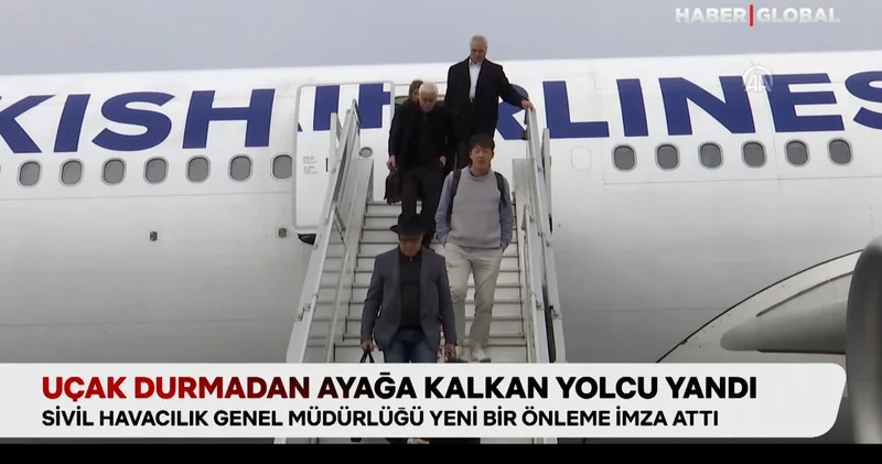 Uçak durmadan ayağa kalkan yolcu yandı
