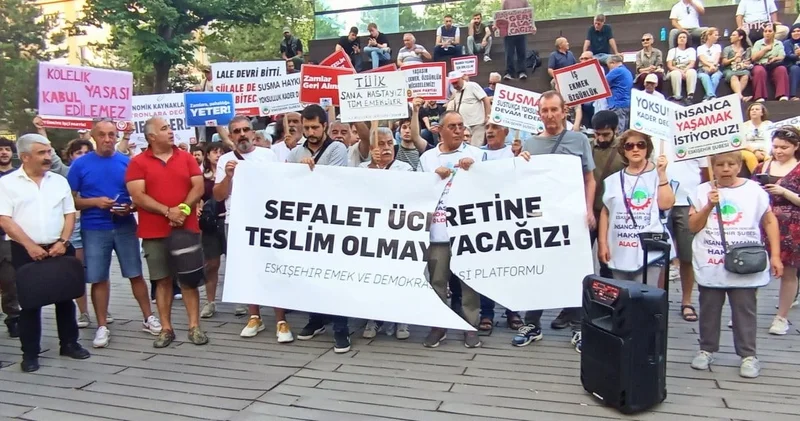 AKP standından sefalet ücreti pankartına saldırı