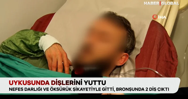 Uykusunda dişlerini yuttu
