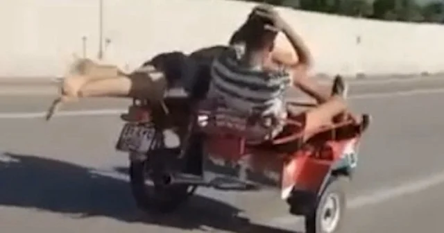 Motosikleti yatarak kullanan sürücüye 24 bin 997 lira ceza VİDEO İZLE