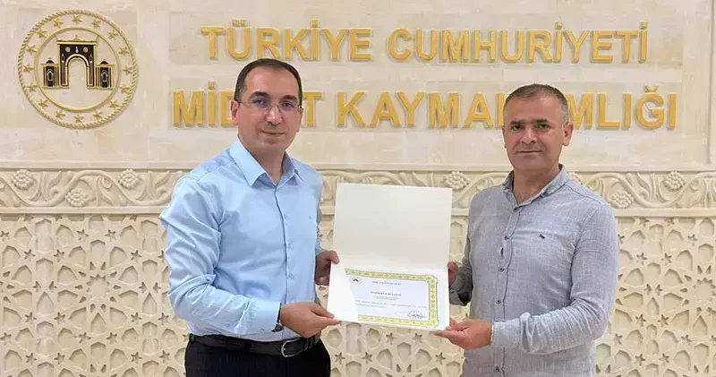 Midyat Kaymakamı Özdemir den DHA muhabirine teşekkür belgesi