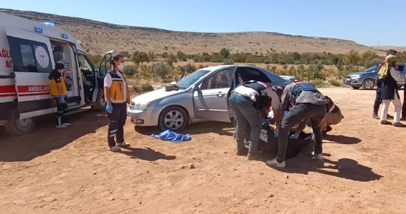 Aracında kalbinden bıçaklanarak öldürülmüş halde bulundu