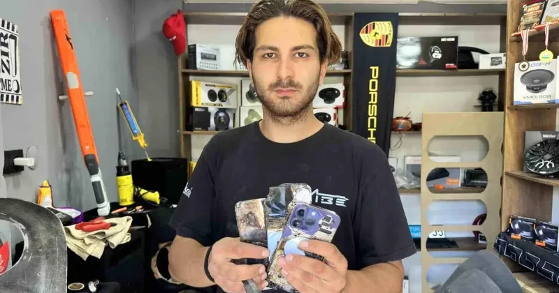 Cebindeki Telefon Alev Aldı