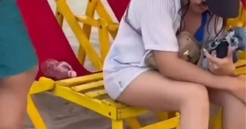 Plajda mide bulandıran görüntüler! Şezlongda otururken tuvaletini yaptı