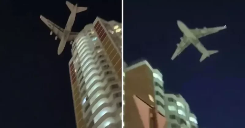 Dünyanın en büyük kargo uçağı droneden kaçarken az daha binalara çarpıyordu