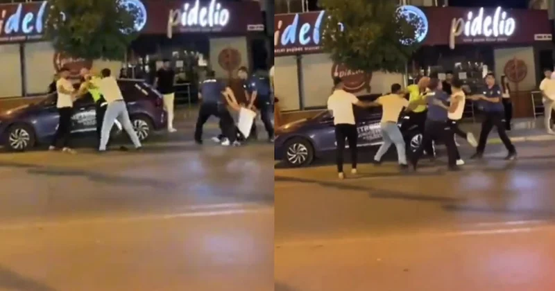 İzmir in göbeğinde şehir eşkıyaları kendilerine ceza yazan trafik polisine tekme tokat saldırdı! Sözcü Gazetesi