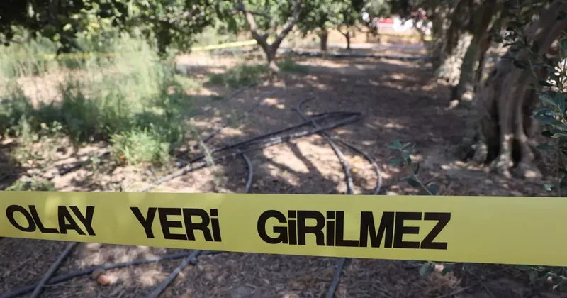 Para için arkadaşını narenciye bahçesinde satırla doğrayan şahıs yakalandı