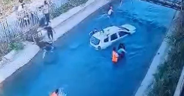 Sulama kanalına uçan cipteki 2 kişiyi çevredekiler kurtardı Adana Haberleri