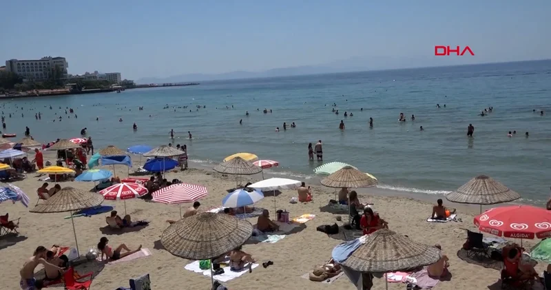 Kuşadası’nda plajlar doldu: Sokaklar ve meydanlar boş kaldı