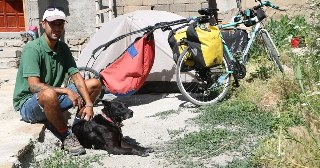 Şili den bisikletle yola çıkıp köpeğiyle 80 ülke gezdi Hakkari Haberleri