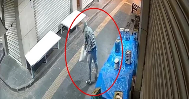 Siirt te dükkan önünden fıstık hırsızlığı kamerada Siirt Haberleri