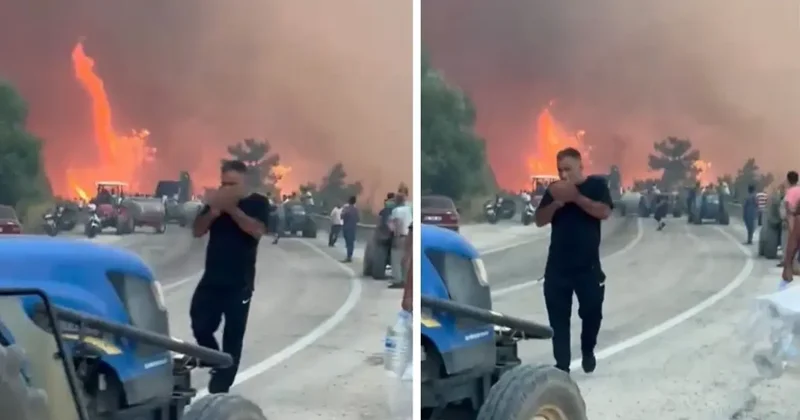 Alevlerin ortasında tepki çeken görüntüler! Orman kül olurken, o sigara yaktı