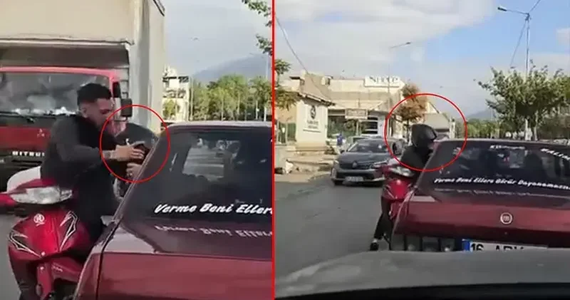 Trafikte kavga ettiği motosikletlinin kaskını aldı; o anlar kamerada