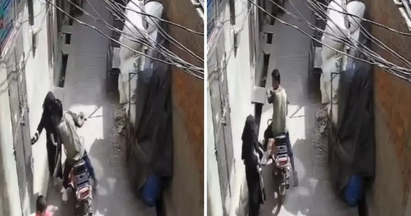 Motosikletli genç, sokakta sıkıştırdığı kadını zorla öptü
