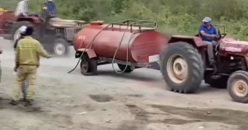 Fedakar çiftçi jant üzerinde yangına su yetiştirdi