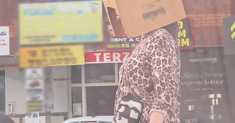 Sokakta kafasında kartonla gezdi, görenleri şaşkına çevirdi!