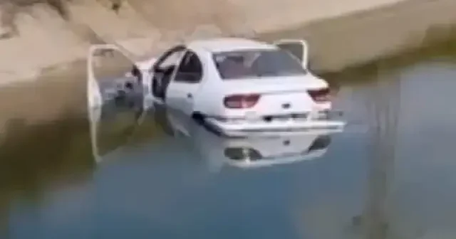 Adana da otomobil sulama kanalına devrildi VİDEO İZLE
