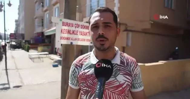 Çöp sorununa çözüm bulamayan yönetici yazdığı tabelayla gündem oldu