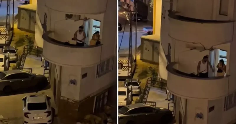Balkona iç çamaşırı ile çıktı, komşuları uyarınca tüfekle geri döndü