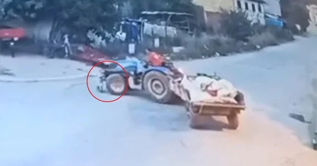 2 yaşındaki Batu nun, babasının kullandığı traktörün altında kaldığı anlar kamerada Bursa Haberleri